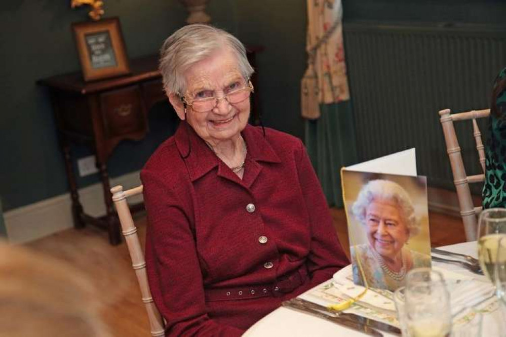 Kathleen with her birthday card from the Queen. Kathleen with her birthday card from the Queen.