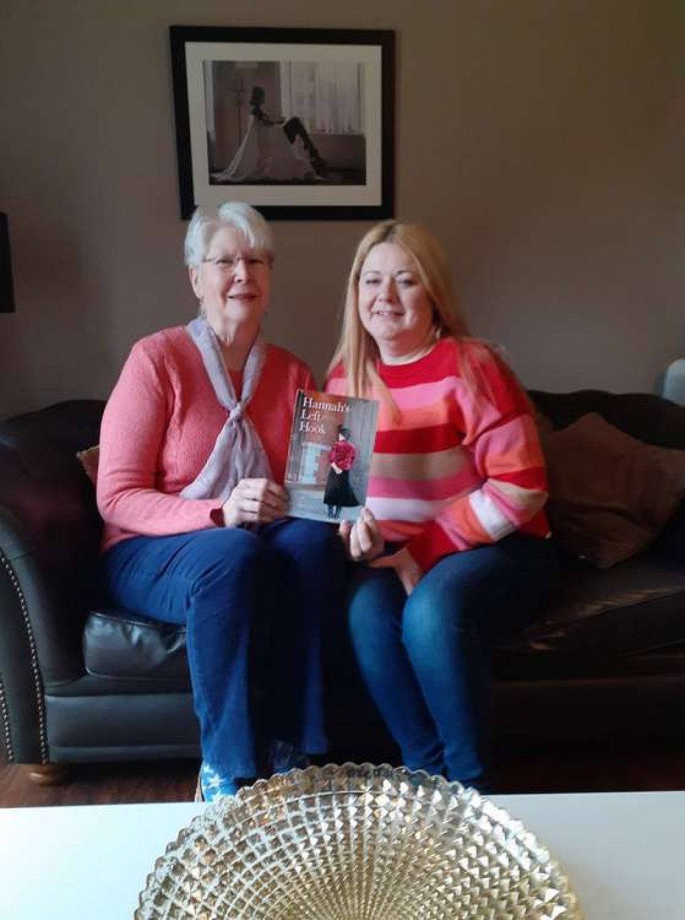 Jo (right) with her step-mother Sue and the book the play is based on.