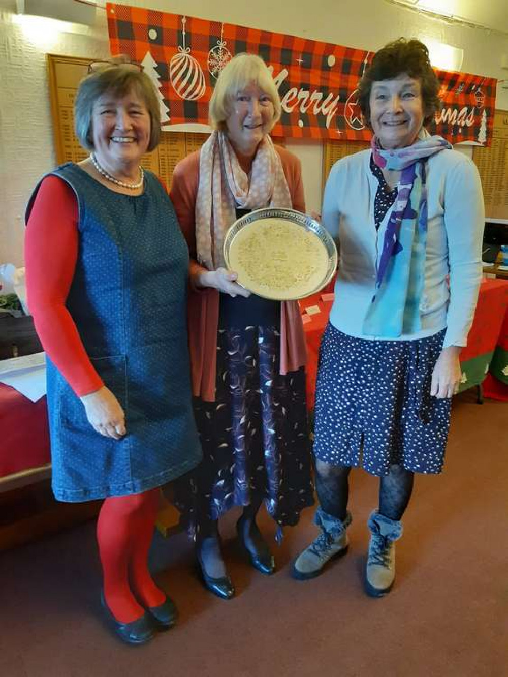 Paula Heasman, the  new Ladies' captain (left) accepts the Scratch Cup from outgoing Captain Anne Jarvis. Picture by Margaret Kenchington.