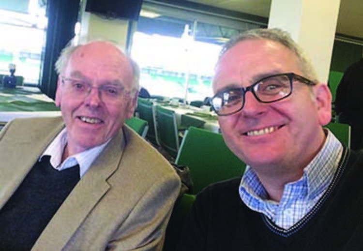 John Lukins pictured with Lyme Regis Football Club chairman Howard Larcombe