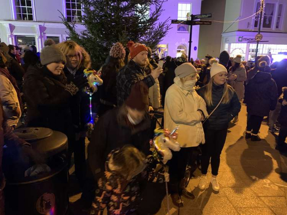 The crowd gathers in the town square before the Christmas lights countdown