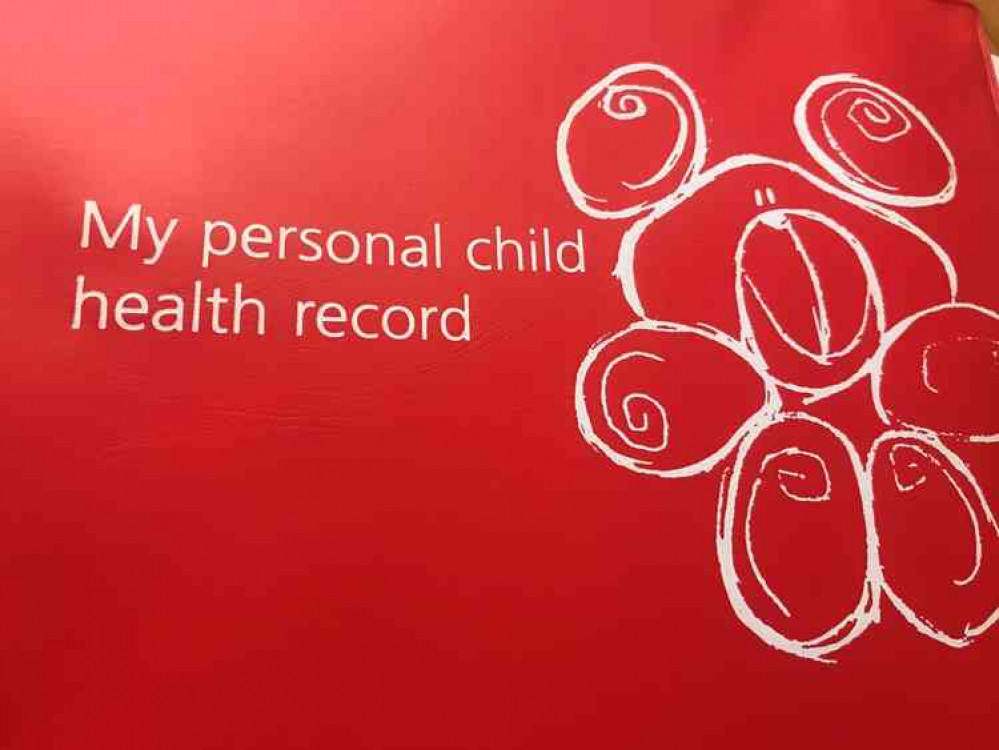 The front cover of the health records book The front cover of the health records book