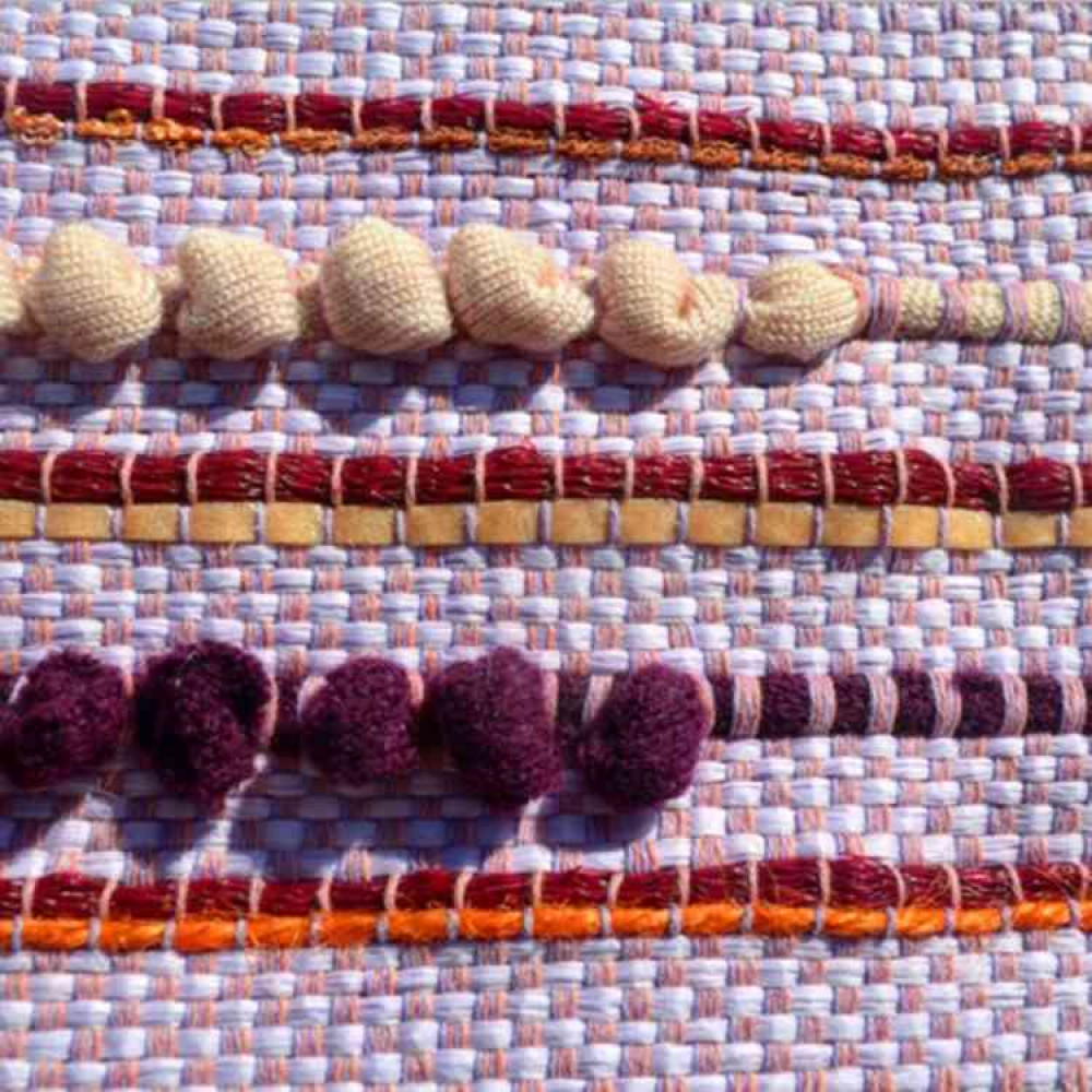 One of Phoebe's weavings, featuring colours based on the houses in Burano, Italy. One of Phoebe's weavings, featuring colours based on the houses in Burano, Italy.