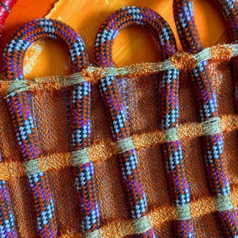 Climbing ropes incorporated into a weaving, using colours based on the houses in Burano, Italy and patterns inspired by azulejo tiles. Climbing ropes incorporated into a weaving, using colours based on the houses in Burano, Italy and patterns inspired by azulejo tiles.