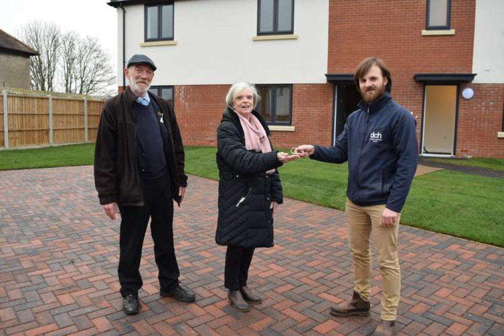 Alastair McCraw and Jane Osborne collect keys from DCH's Michael Porter (Picture credit: Christine Knight -Babergh)