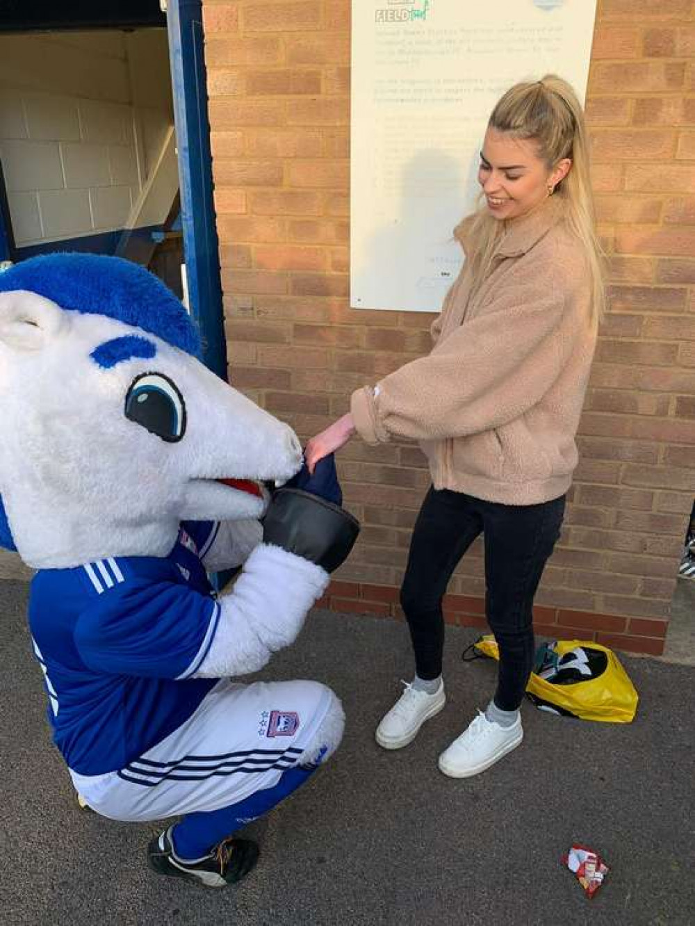 Bluey gets down on one knee for Town fan Emma Squirrell (Picture contributed)