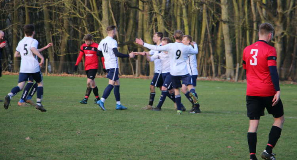 Woolverstone celebrate scoring against Melton earlier this season (Picture credit: Peninsula Nub News)