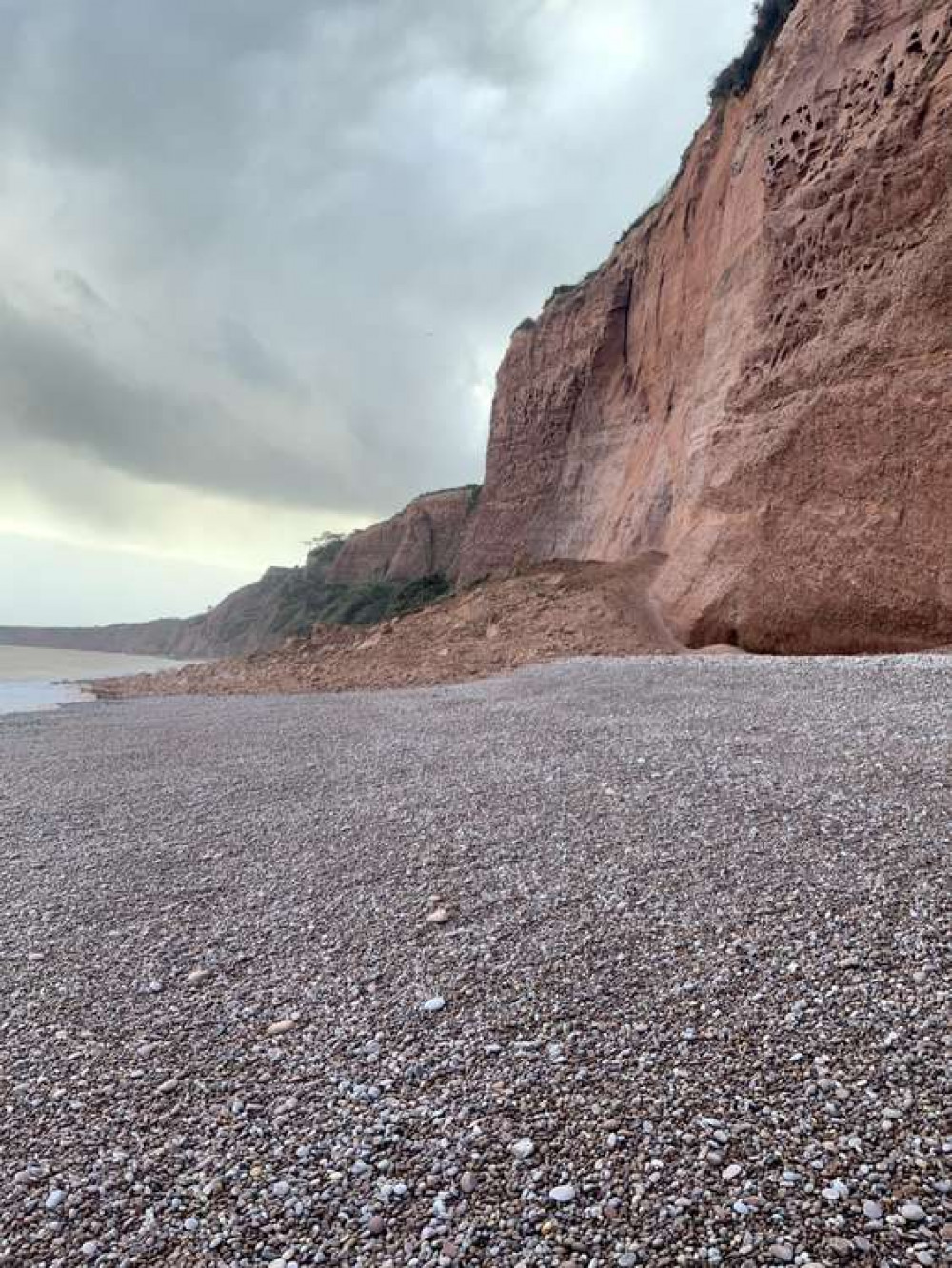 Debris covering the whole beach area nearest to Jubilee Park (Credit: EDDC)