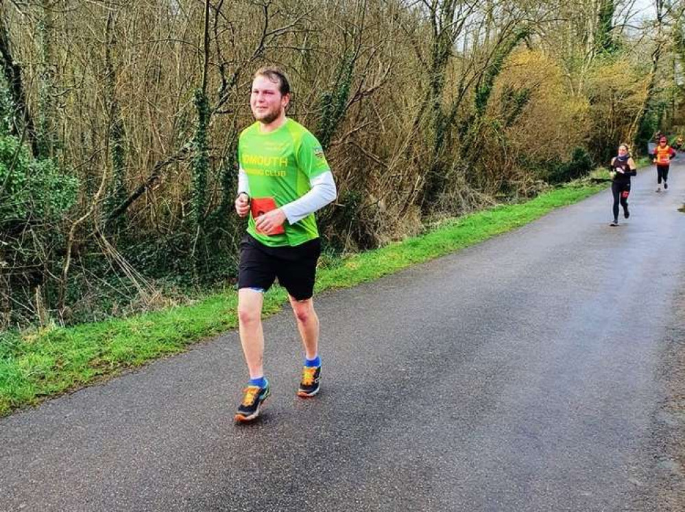 Kyle Baker running up another hill in Axmouth