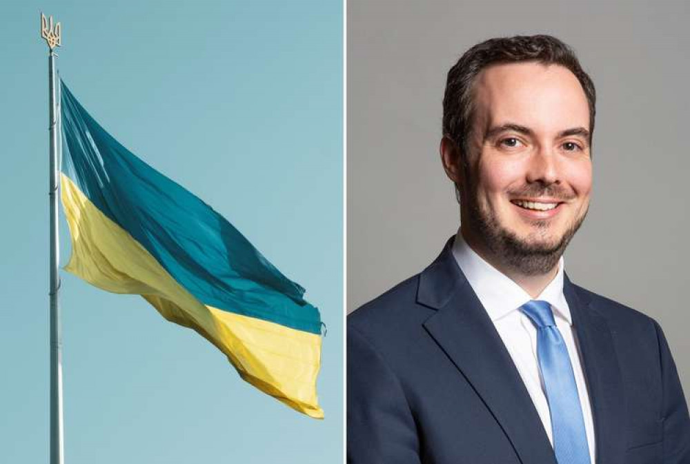 L: Ukrainian flag (Unsplash). R: Official portrait of Simon Jupp MP (David Woolfall - https://members-api.parliament.uk/api/Members/4862/Portrait?cropType=ThreeFourGallery: https://members.parliament.uk/member/4862/portrait, CC BY 3.0, https://commons.wik