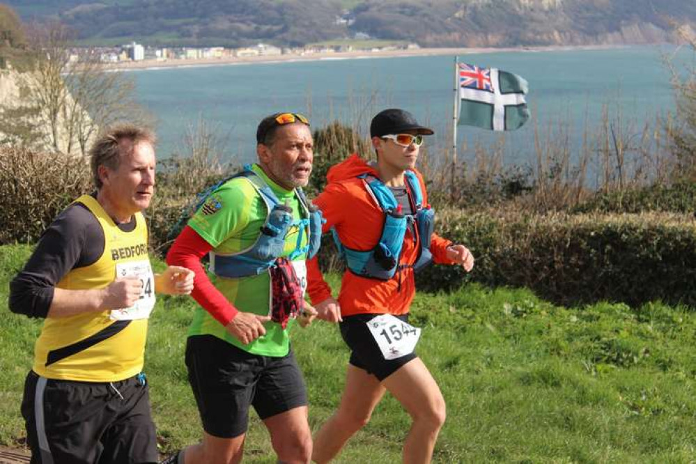 Nev at Beer Head with Seaton behind him.