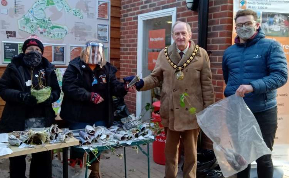 Cllr Malcolm Gee, Chair of South Derbyshire District Council, with tree planting volunteers