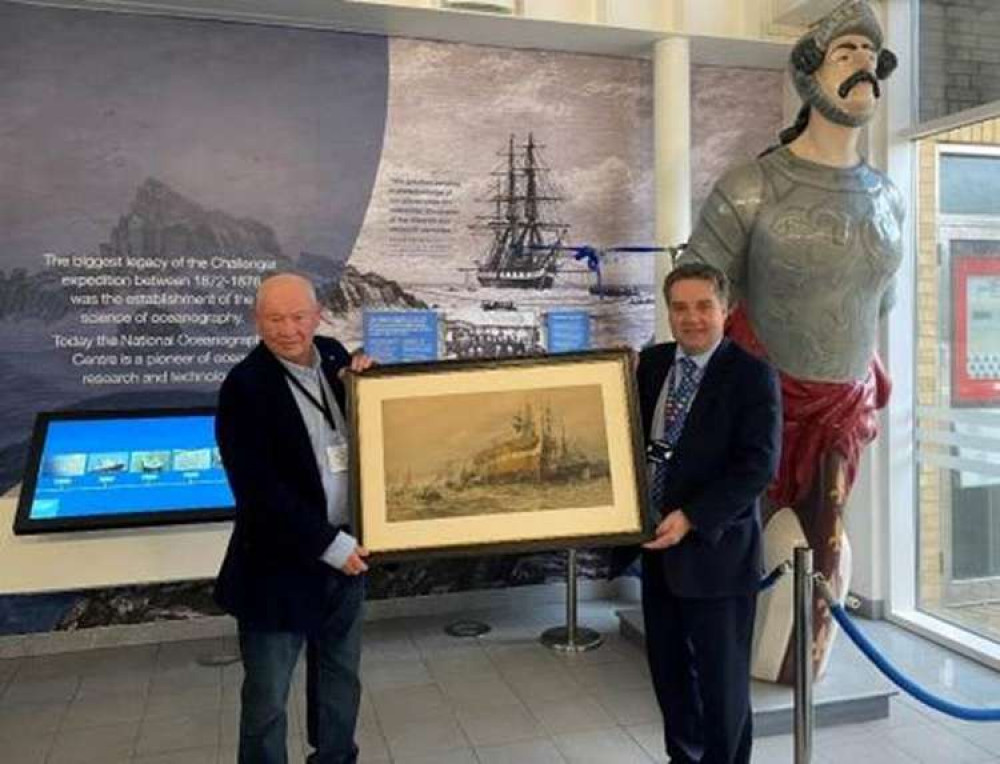 Teddington businessman, Martin Bosher (left) hands over the painting to the National Oceanography centre