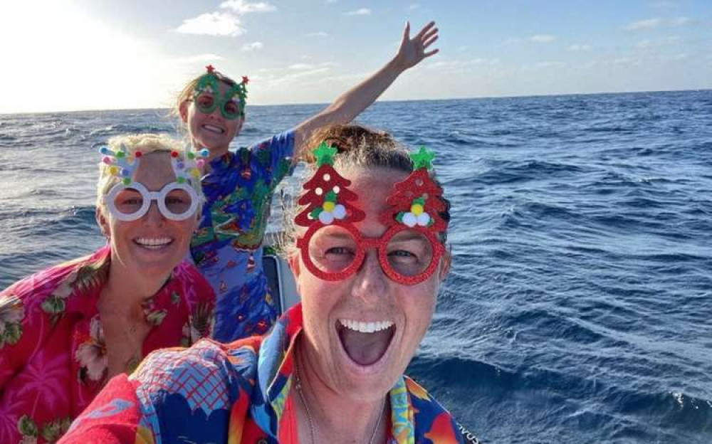 The girls celebrate Christmas on the ocean