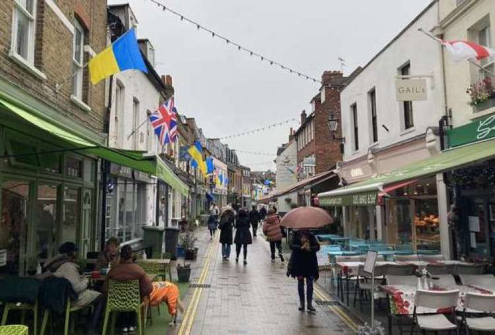 Businesses on Twickenham's Church Street fly Ukraine flags in solidarity with the invaded country