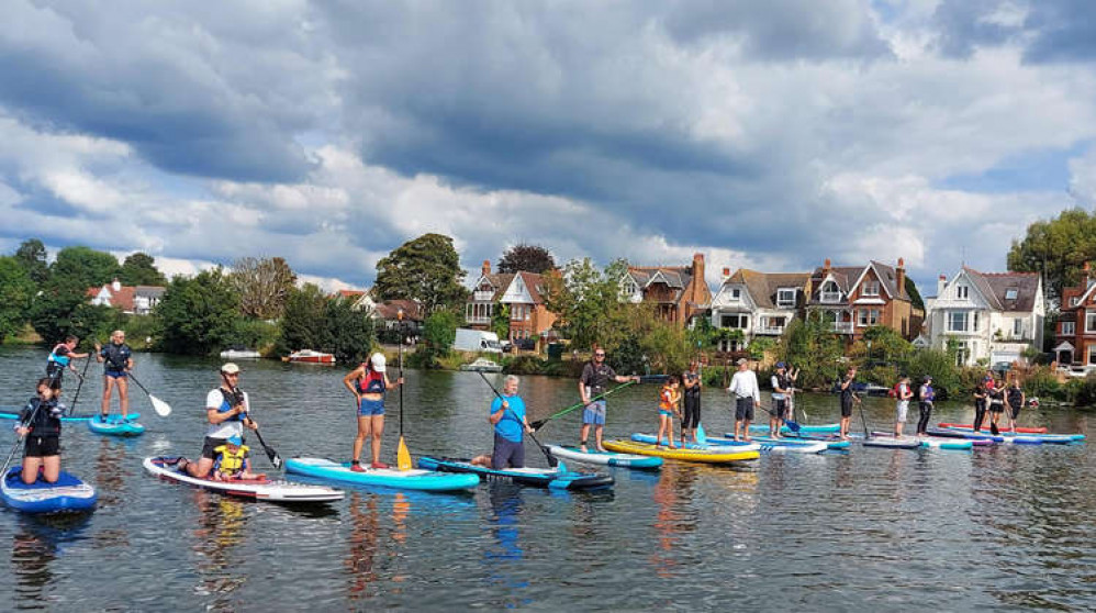 Paddleboarders with Good Life Paddle Co. take to the Thames in Teddington (Image: Leah Crane)