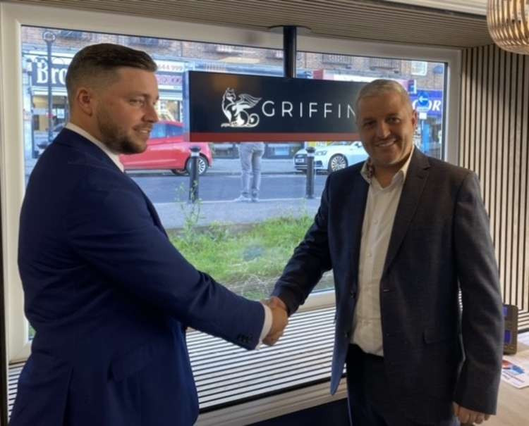 Griffin director Alan Webb (right) welcomes Curtis Johnson to the new Stanford-le-Hope branch.