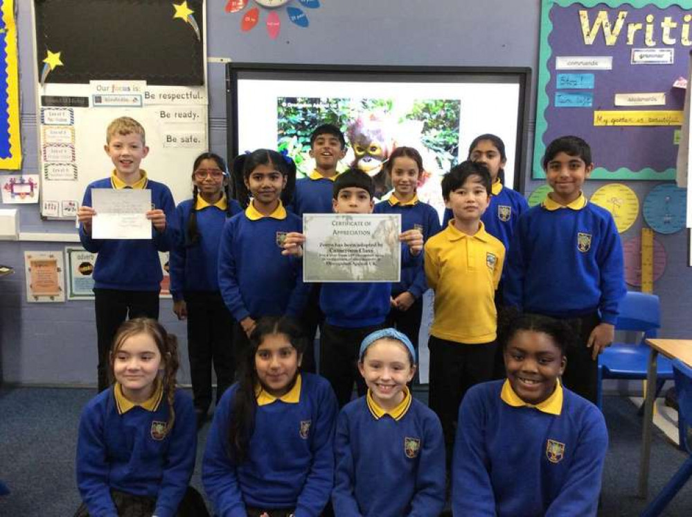 Cameroon class with their certificate of adoption for Zorro (credit: Mrs Clements, Sellincourt Primary School)