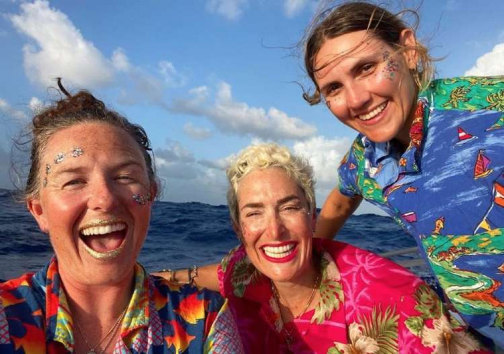 The race's commentator said the girls had made the row look like one big party thanks to their fun Hawaiian shirts and glowsticks The race's commentator said the girls had made the row look like one big party thanks to their fun Hawaiian shirts and glowsticks