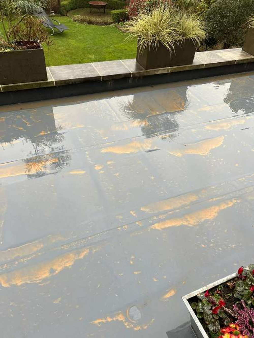 Gary Lineker, who lives in Barnes, tweeted a picture of the dust washed out of the sky onto his patio. Gary Lineker, who lives in Barnes, tweeted a picture of the dust washed out of the sky onto his patio.
