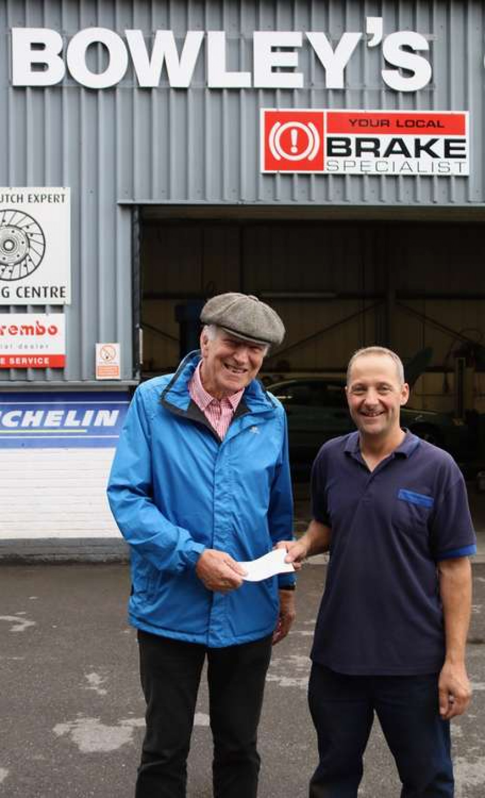 Bowley's Jason Tunnicliffe presents their £350 cheque to SOUP organiser Ross Young