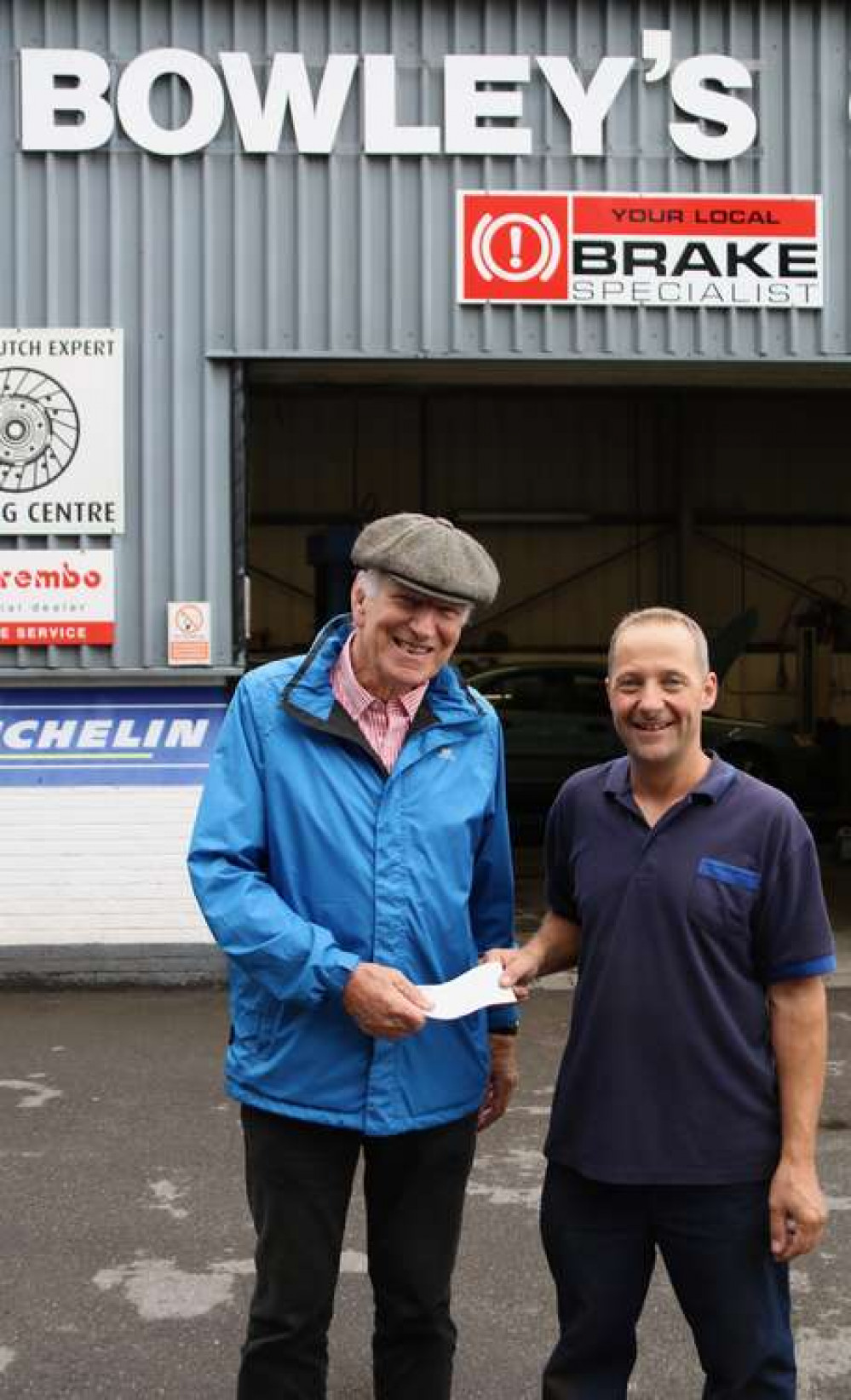 Bowley's Jason Tunnicliffe presents their £350 cheque to SOUP organiser Ross Young