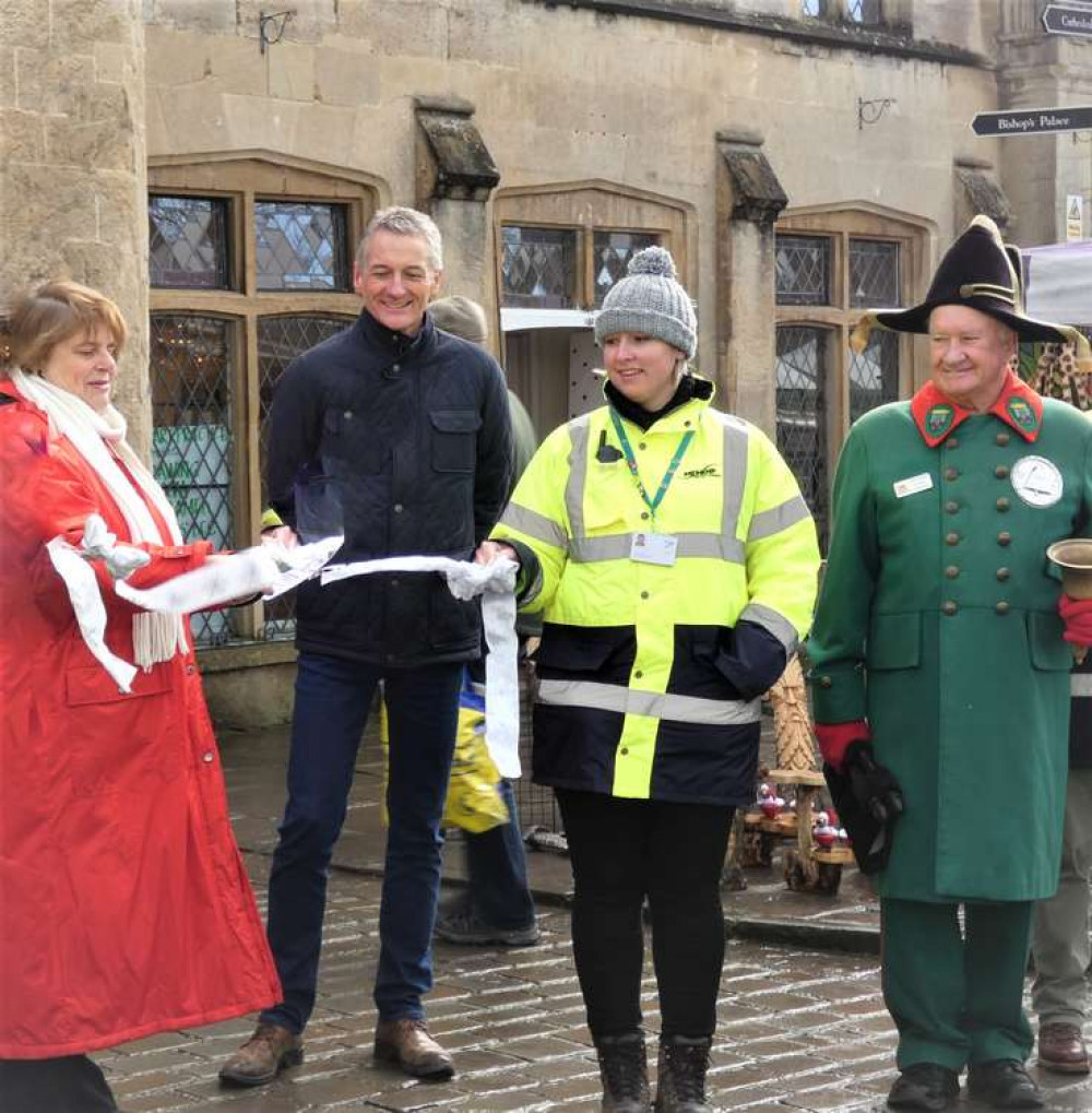 Left to right: Cllr Ros Wyke, Leader of Mendip District Council; Stuart Brown, Chief Executive Officer; Haylee Wilkins, Assistant Chief Executive Officer and Head of Services for Neighbourhoods and Wells Town Crier Len Sweales at the last Christmas market Left to right: Cllr Ros Wyke, Leader of Mendip District Council; Stuart Brown, Chief Executive Officer; Haylee Wilkins, Assistant Chief Executive Officer and Head of Services for Neighbourhoods and Wells Town Crier Len Sweales at the last Christmas market