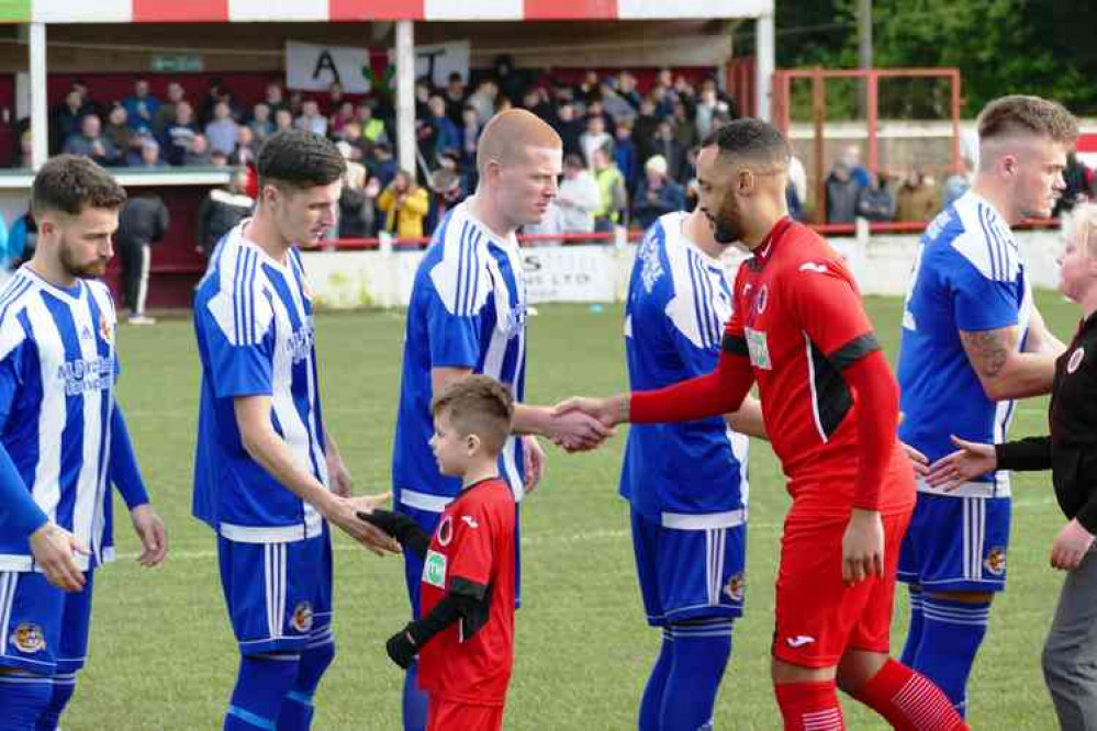 Let's shake on it: The two teams before kick-off