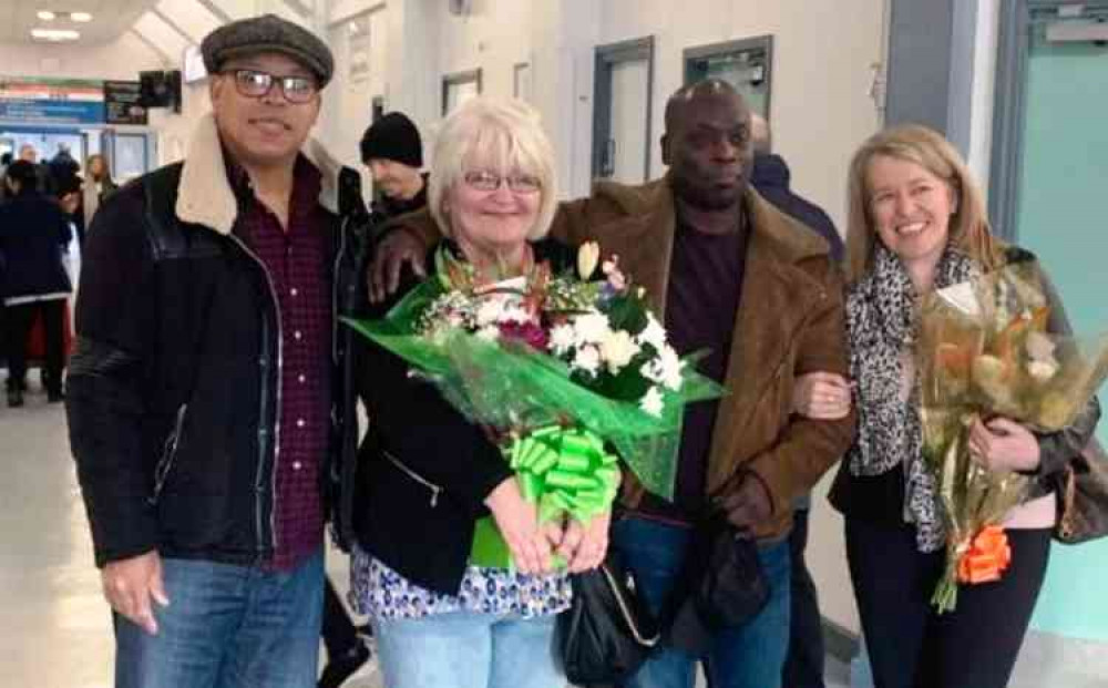 Helping hands: Dawn Downes, second from left, with Sam Percival, second from right, at the George Eliot hospital with two passengers from the plane drama either side of themn