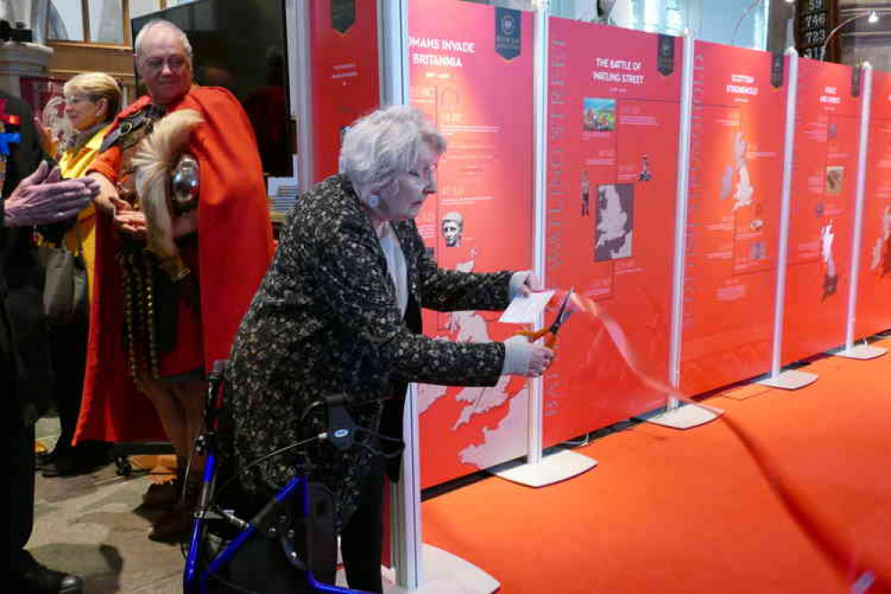 Opening a door on history: Historian Margaret Hughes cuts the ribbon to launch the Roman Mancetter & Boudica Heritage Centre