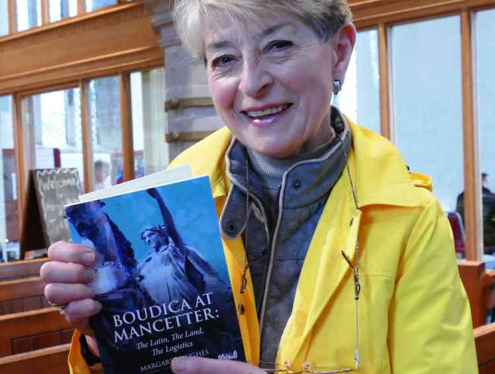 Well read: Retired BBC newsreader Kay Alexander with a first edition she purchased at Saturday's event