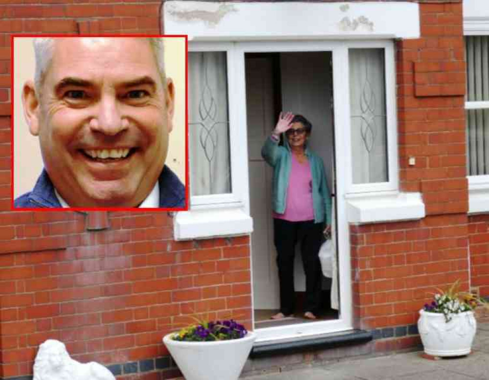 Sorry you can't come in: A pensioner waves to MP Craig Tracey