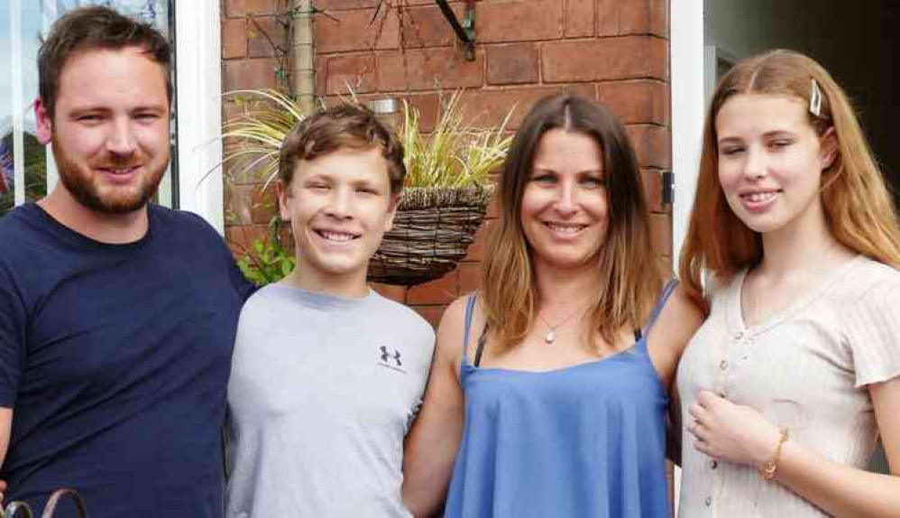 Also celebrating: John Cooke's grand-daughter Nikki Collins, second from right, with children Reef and Imogen and partner Daniel Evans