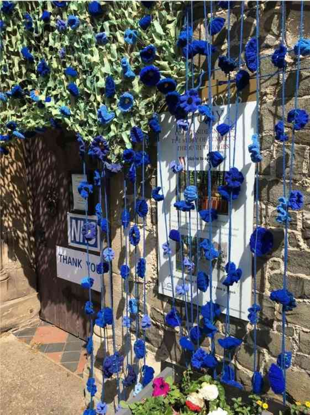 Appealing: Poppies cascade down the front of St Mary's Church