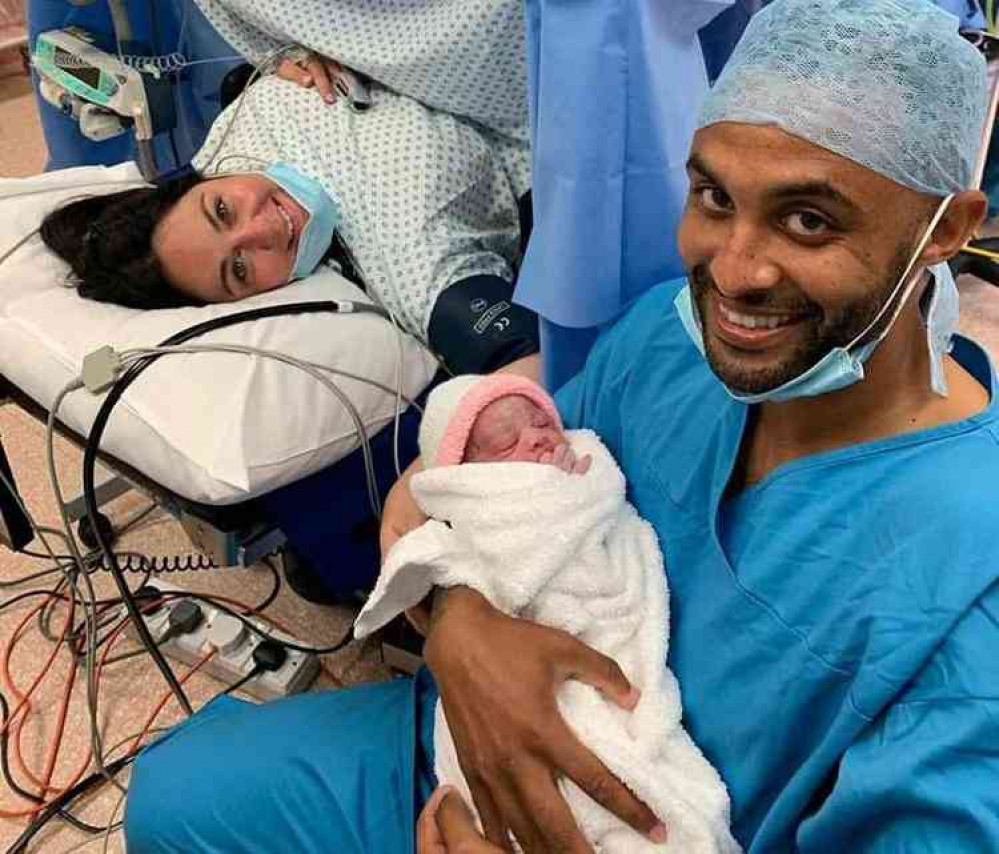 Smiles of joy: First picture of Brooklyn with proud parents Joe and Keeley Obi