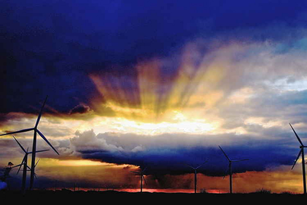 Sunset over the wind turbines Sunset over the wind turbines