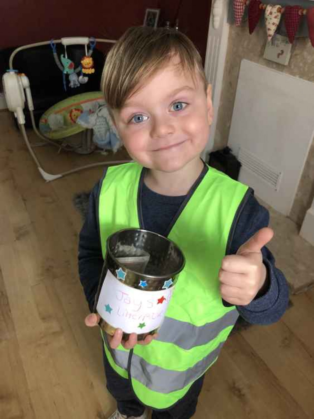 JayJ with his collecting tin JayJ with his collecting tin
