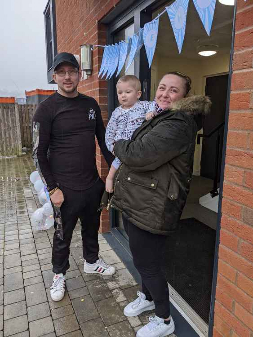 Reign and his parents were greeted by family members when he returned home. Reign and his parents were greeted by family members when he returned home.
