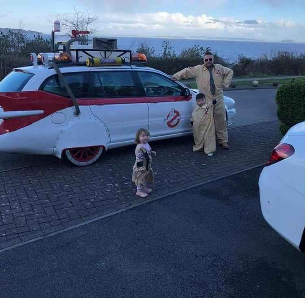 Phil, Victor and Allessia Price with the Ecto-1