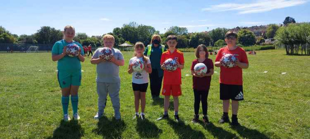 (From left to right) Natlia, Cadell, Carrie, Kody, Serren, Mylo, Year Five pupils at Ysgol Gwaun Y Nant with Pam Bowen, Morrisons Community Champion, behind