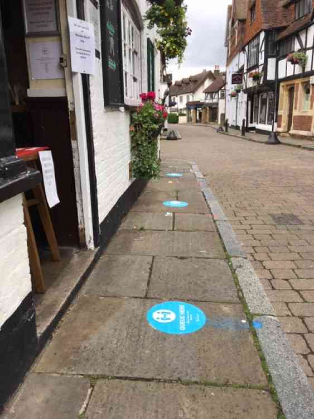 Markings on the pavement in Church Street remind people to keep their distance.