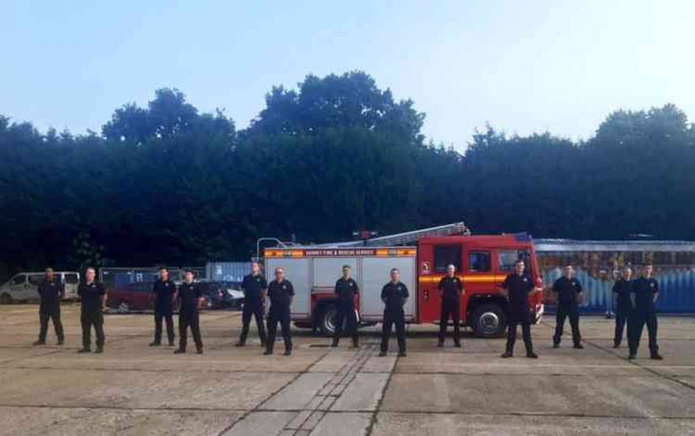 On parade: the nine new recruits and their instructors.