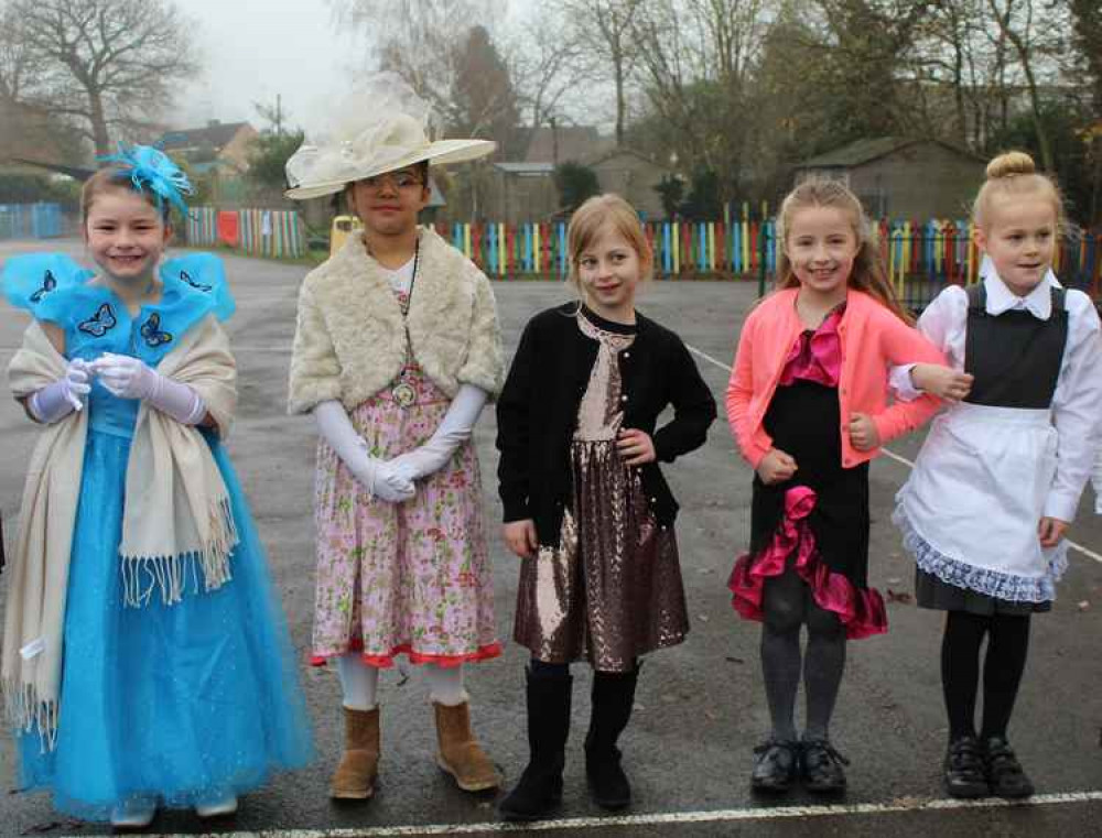 A group of young ladies, dressed in their best finery for the First Class lounge. A group of young ladies, dressed in their best finery for the First Class lounge.