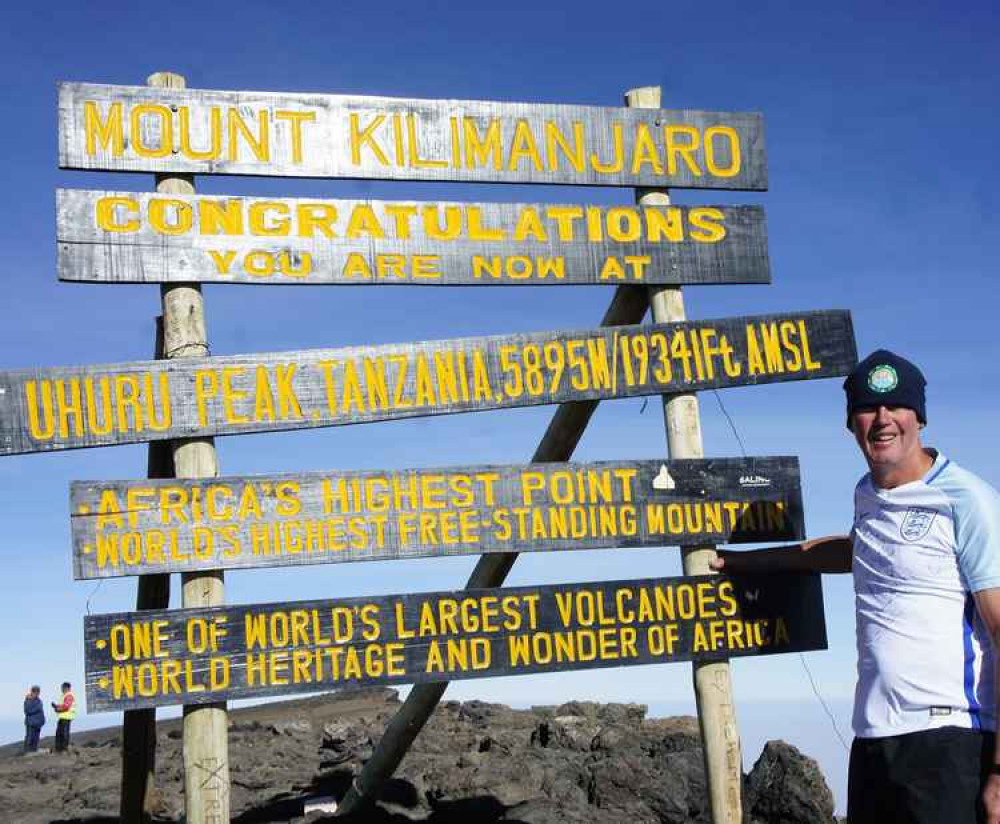 Paul Jameson at the summit of Mt Kilimanjaro.