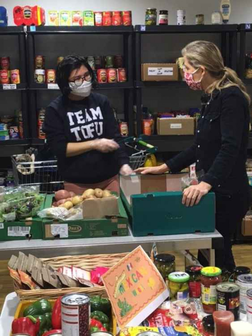 The Countess chats with one of the store volunteers.