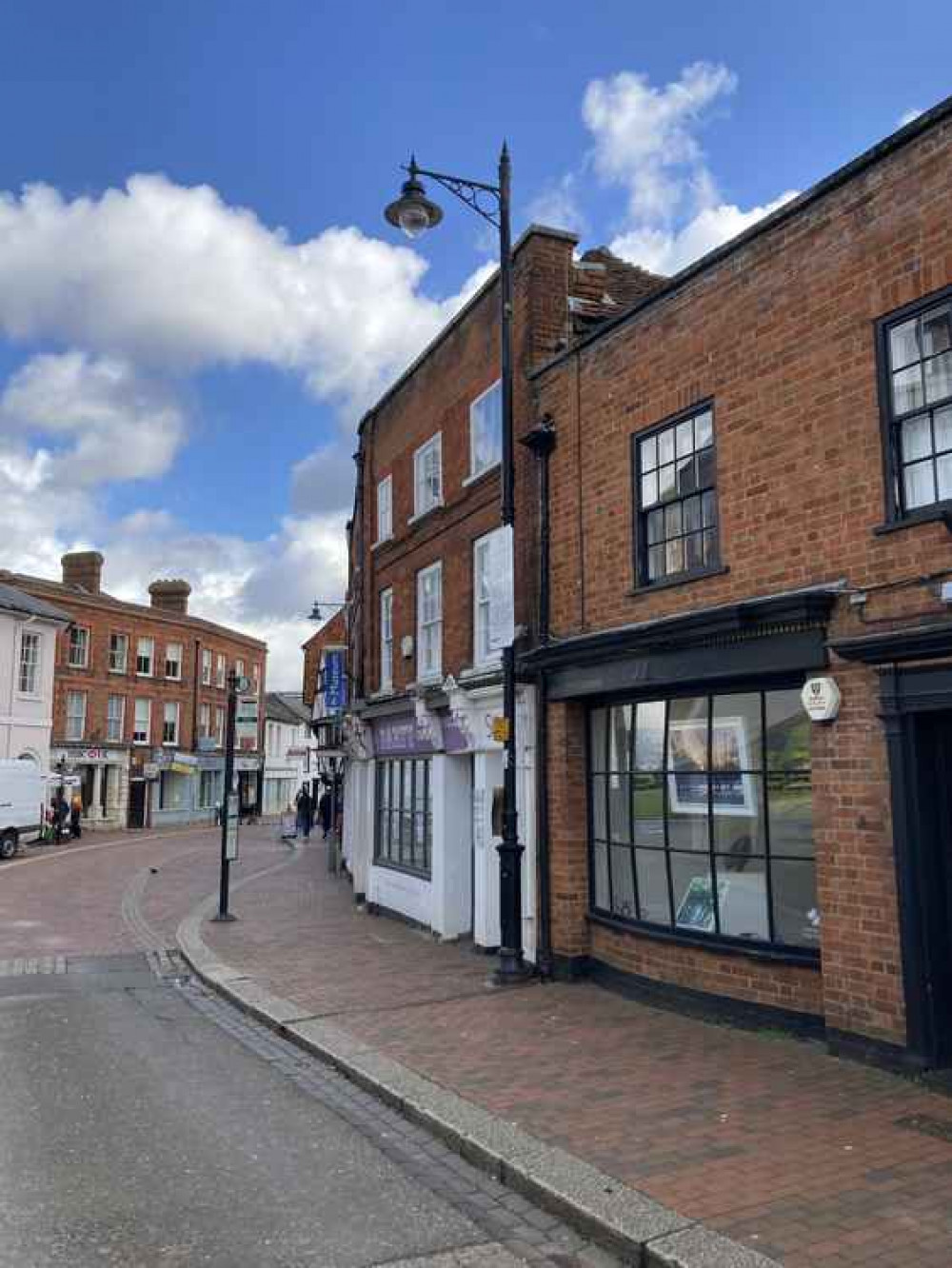 The streetlamp in the upper High Street, close to the spot of one of the original electric lamps, bears a plaque marking the refurbishment of all Surrey's streetlights in 2014. The streetlamp in the upper High Street, close to the spot of one of the original electric lamps, bears a plaque marking the refurbishment of all Surrey's streetlights in 2014.