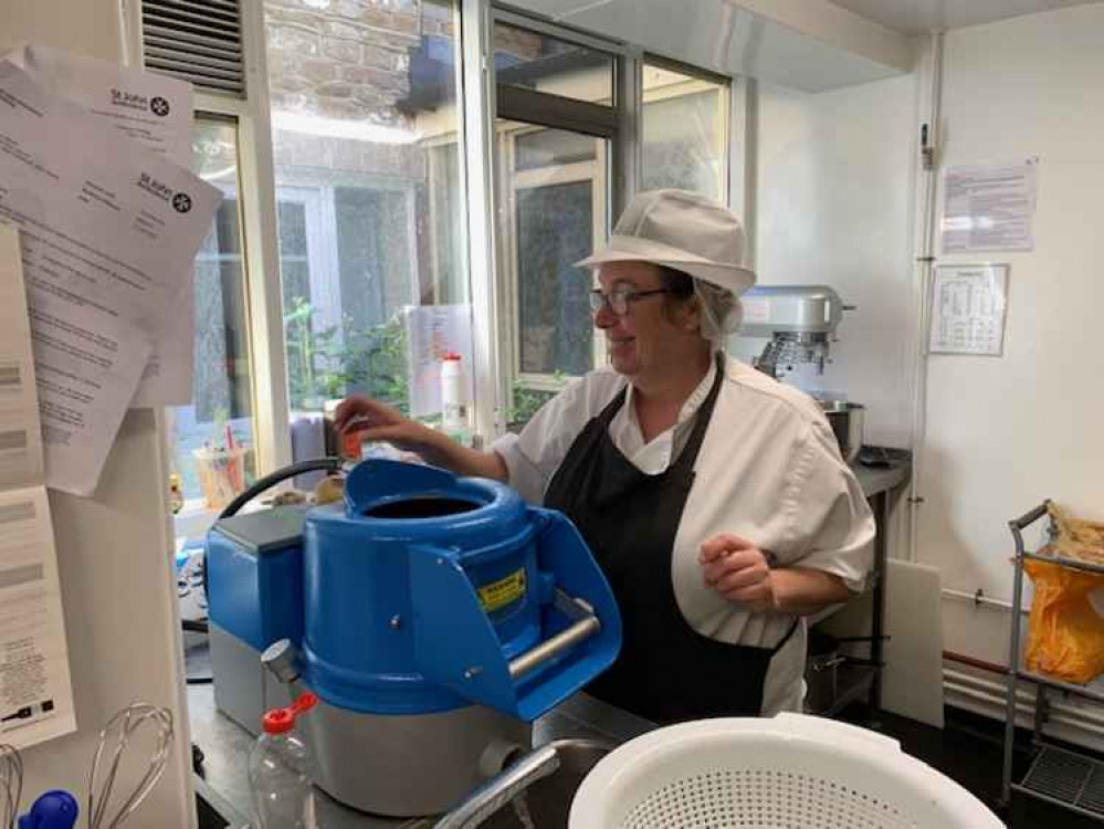 Hard at work in the kitchen. Hard at work in the kitchen.