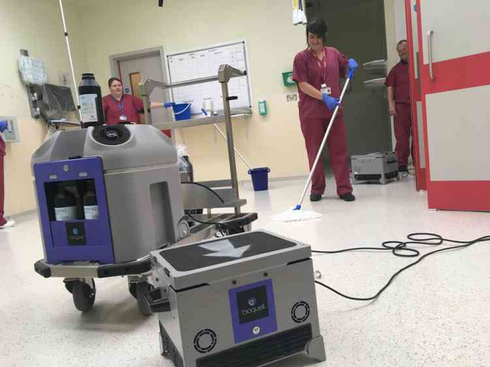 Members of the cleaning team preparing a theatre at Lincoln County Hospital for the HPV machine