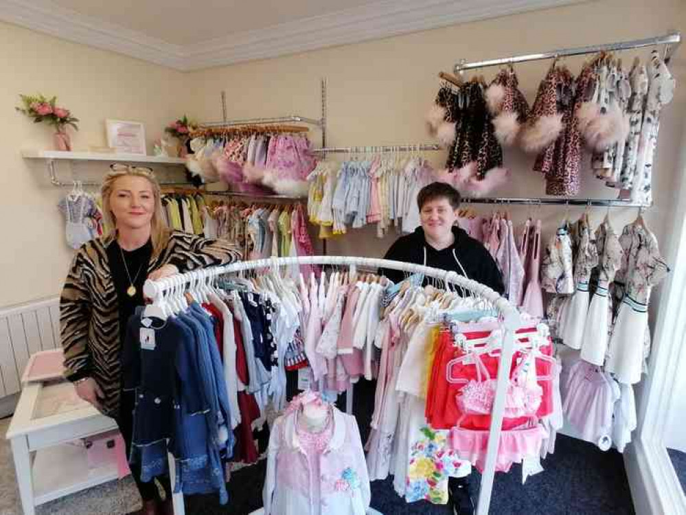 Winnie's Boutique owner Kelly Bright is standing on the left