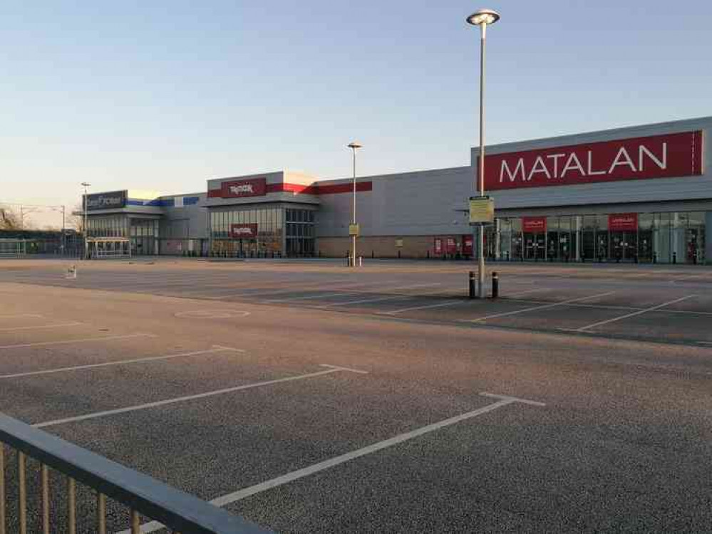 A vast empty car park by Matalan and Curry's PC World